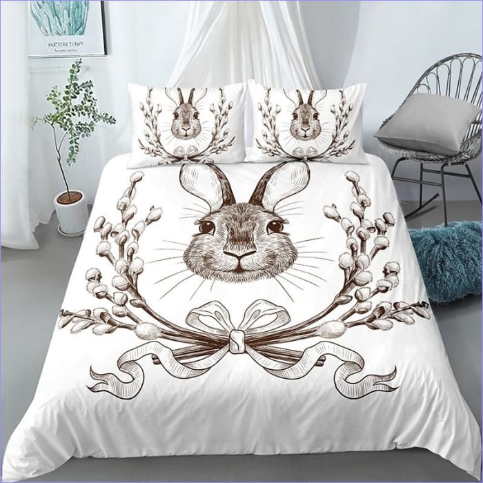 Weißer Bettbezug mit lächelndem Kaninchen