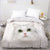 Bettbezug mit weißer Katze
