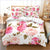 Bettbezug mit Blumenmuster in Weiß und Rosa