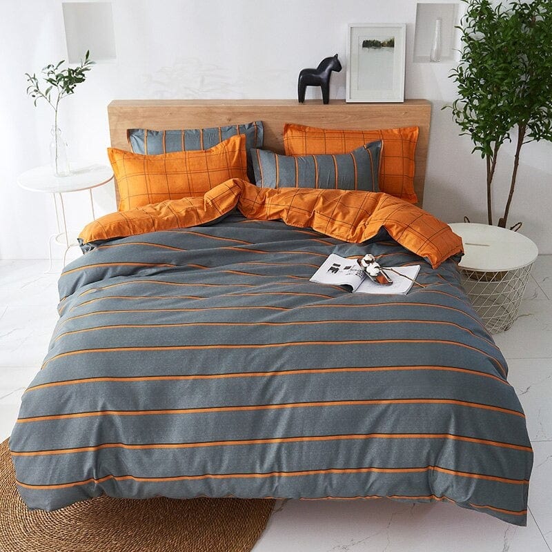 Grauer und orangefarbener Bettbezug