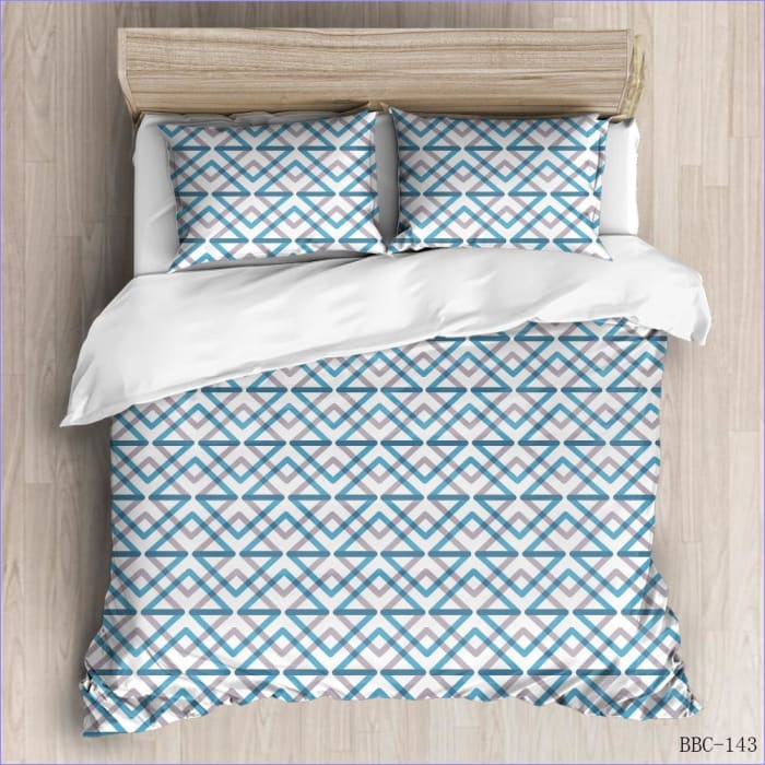 Moderner Bettbezug mit grauen und blauen Quadraten