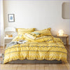 Moderner Bettbezug in leuchtendem Gelb
