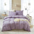 Einfarbiger Bettbezug mit lila Pompons