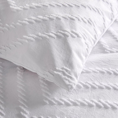 Einfarbiger Bettbezug mit weißen gestickten Linien