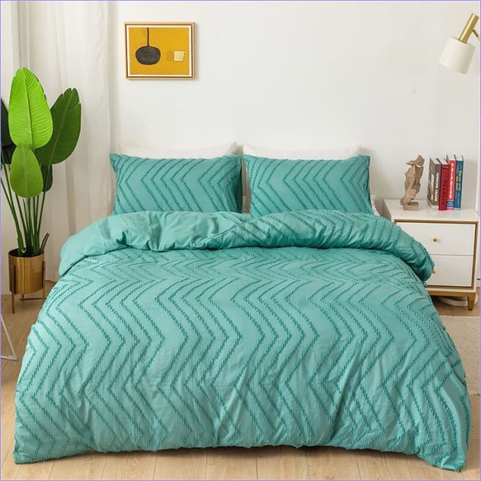 Grüner Bettbezug mit Wellenmustern